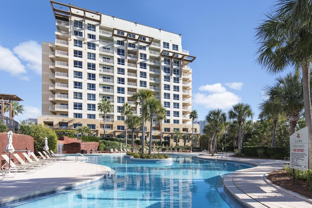 view of swimming pool with a patio