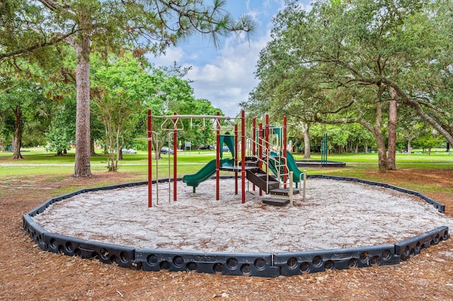 view of playground with a yard