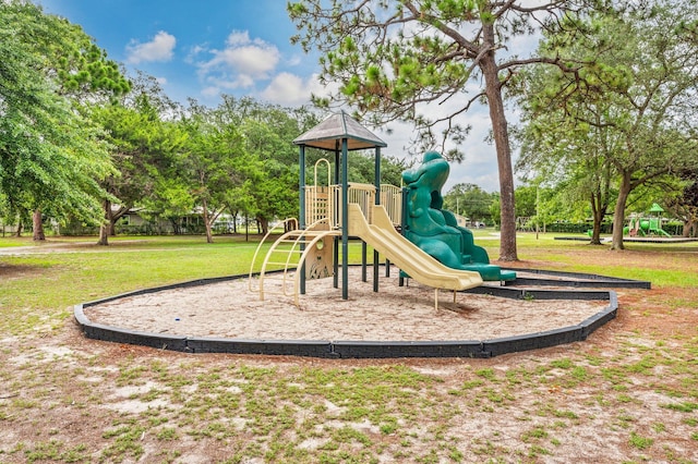 view of play area with a yard