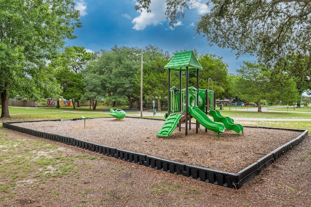 view of jungle gym with a yard