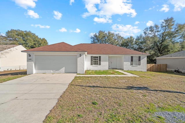 ranch-style house with a garage and a front yard