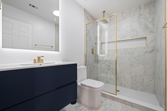 bathroom featuring toilet, vanity, and tiled shower