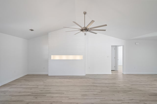 unfurnished room featuring vaulted ceiling, ceiling fan, and light hardwood / wood-style floors