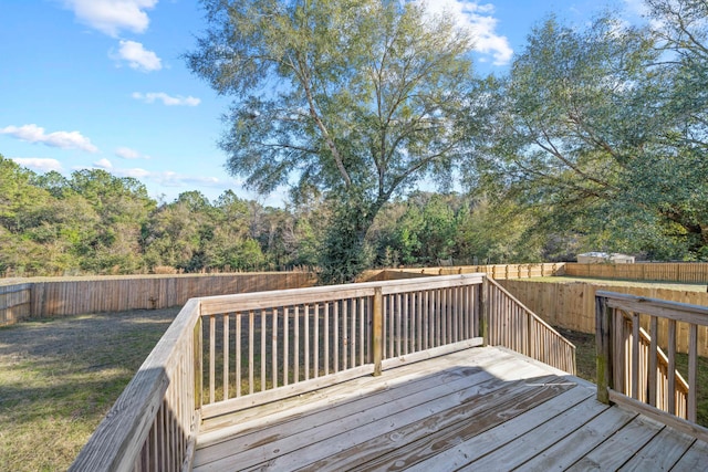 wooden deck with a yard