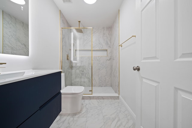 bathroom with toilet, vanity, and tiled shower