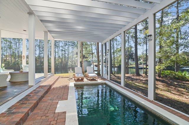 sunroom / solarium with beamed ceiling