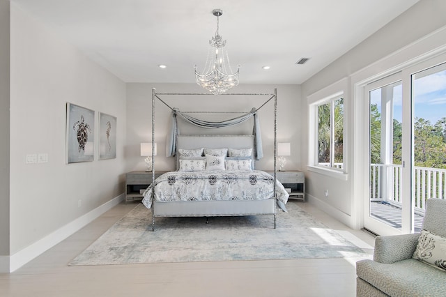 bedroom featuring recessed lighting, visible vents, baseboards, access to outside, and an inviting chandelier