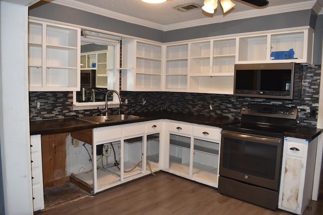 kitchen with sink, stainless steel appliances, and white cabinets