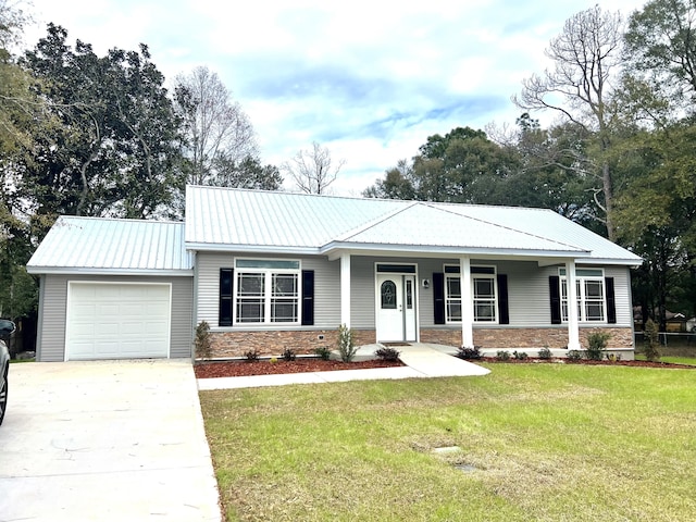 ranch-style house featuring a garage, a front yard, and a porch