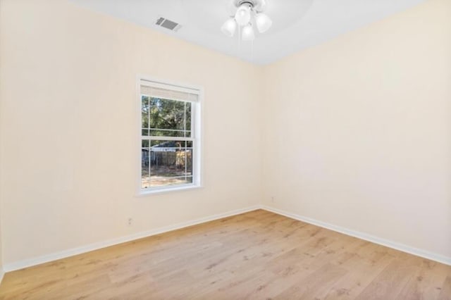 unfurnished room featuring light hardwood / wood-style floors