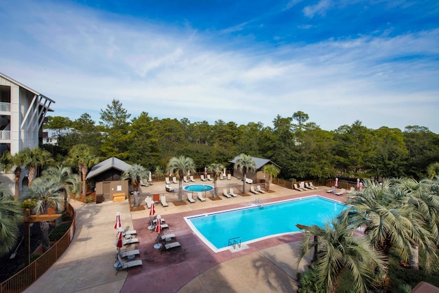 view of pool featuring a patio