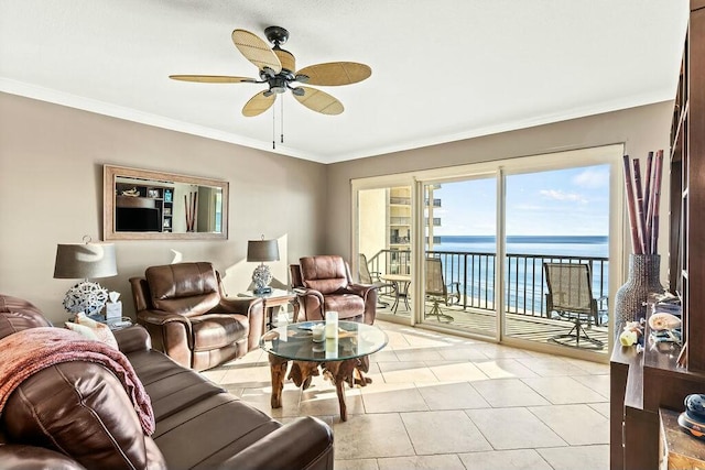 tiled living room featuring ceiling fan and crown molding