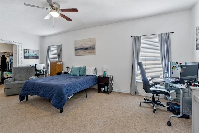 762 Shady St, Fort Walton Beach, FL 32547 - bedroom featuring multiple windows, light carpet, ceiling fan, and a closet