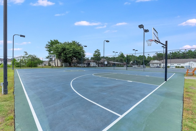 view of sport court with tennis court