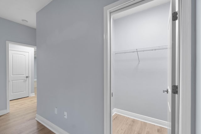 bedroom featuring a closet and light hardwood / wood-style floors