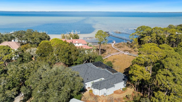 birds eye view of property featuring a water view