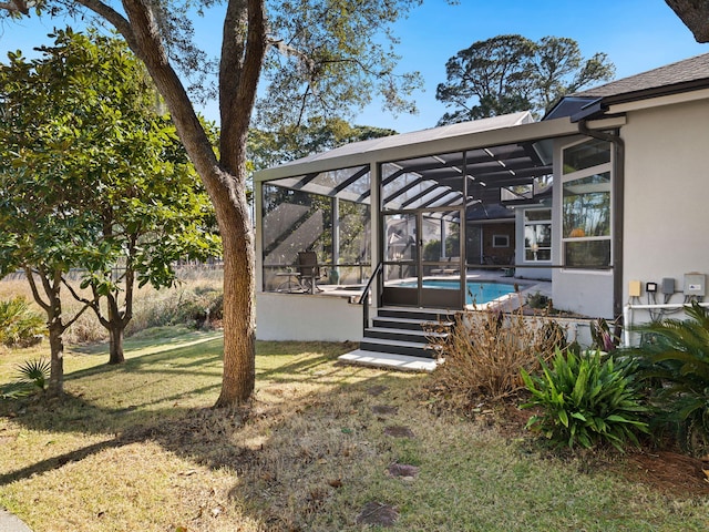 view of yard featuring a lanai