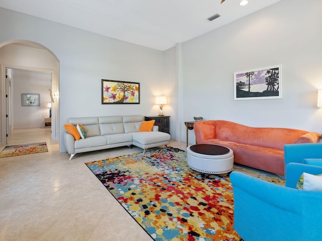 living room with tile patterned floors