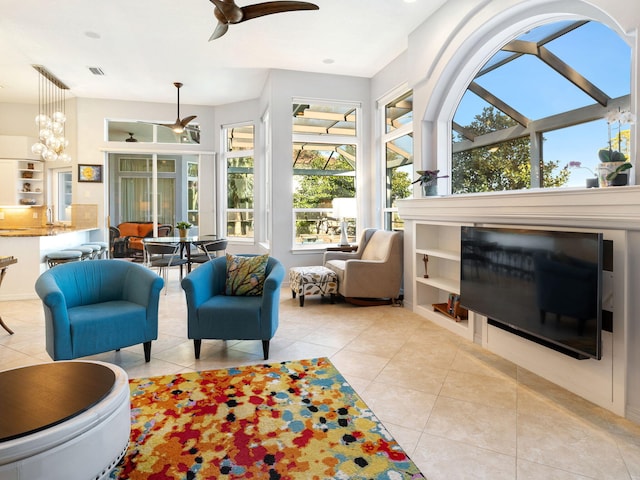 living room featuring ceiling fan and light tile patterned flooring