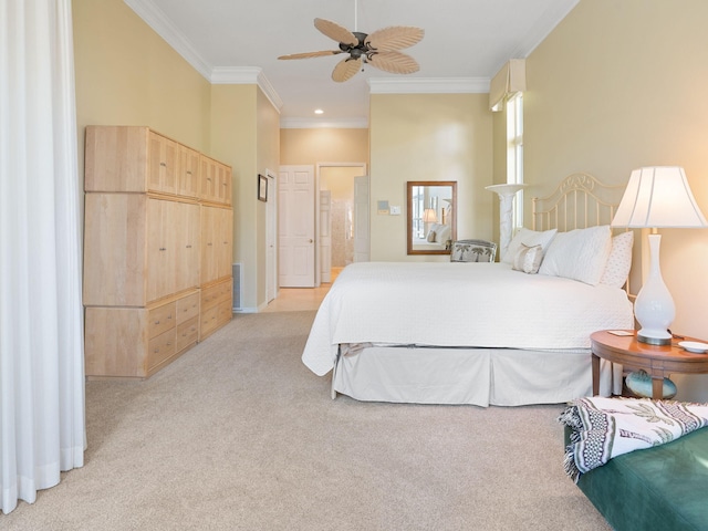 carpeted bedroom with connected bathroom, crown molding, and ceiling fan