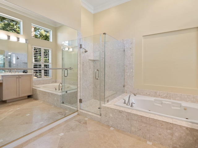 bathroom featuring crown molding, vanity, and separate shower and tub