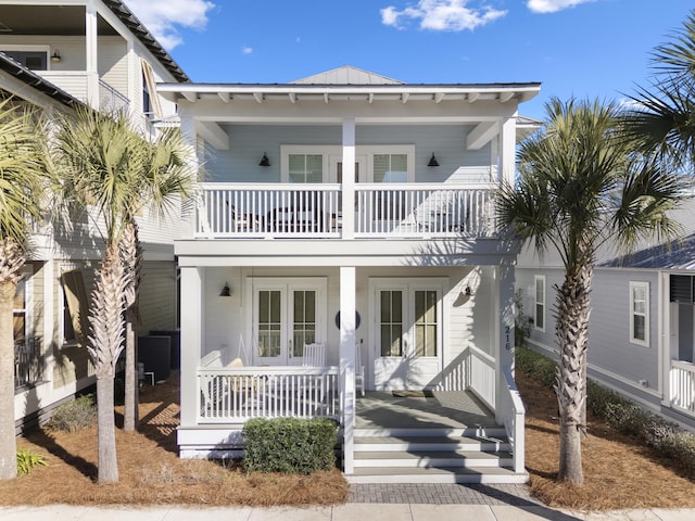 view of front of home featuring a porch and a balcony