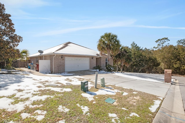 single story home with a garage