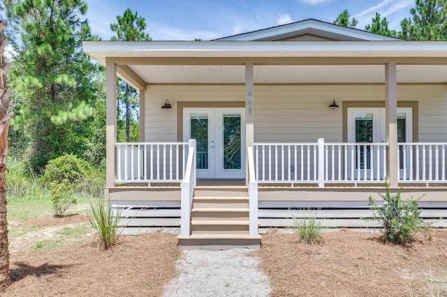 property entrance featuring french doors