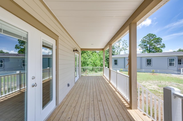 wooden terrace with covered porch