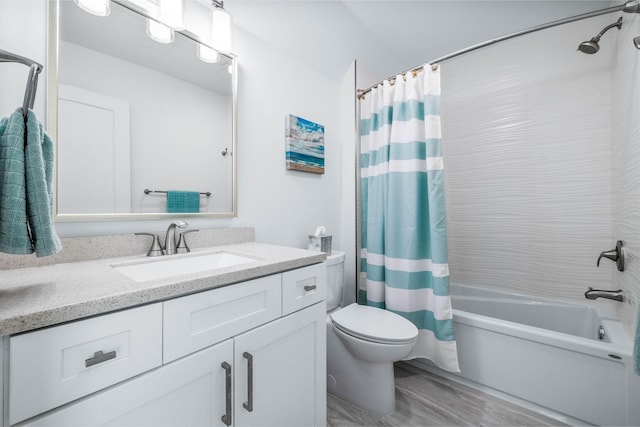 full bathroom featuring toilet, vanity, shower / bath combo, and hardwood / wood-style flooring