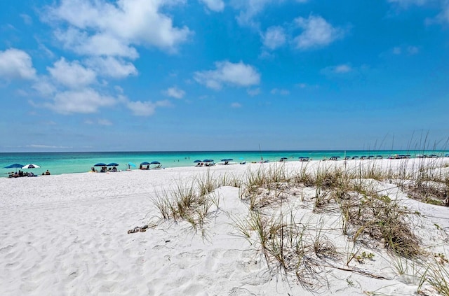 property view of water featuring a beach view