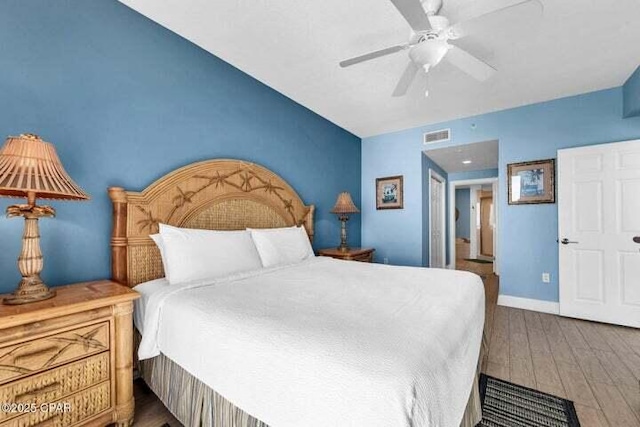 14825 Front Beach Rd Unit 2001, Panama City Beach, FL 32413 - bedroom with ceiling fan and hardwood / wood-style flooring