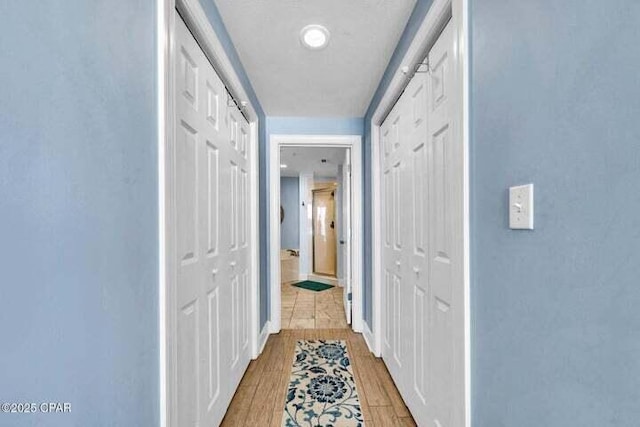 14825 Front Beach Rd Unit 2001, Panama City Beach, FL 32413 - hallway featuring light wood-type flooring