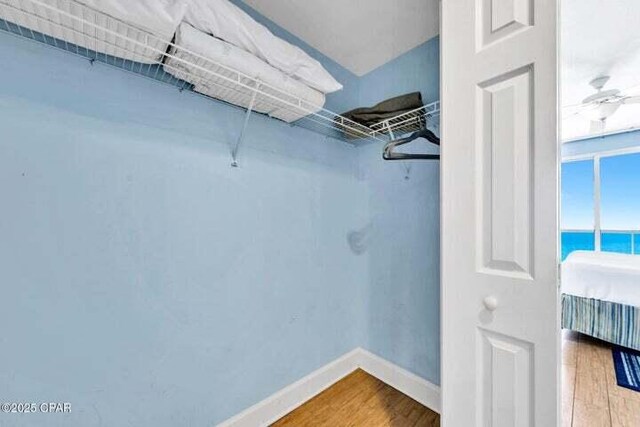 14825 Front Beach Rd Unit 2001, Panama City Beach, FL 32413 - walk in closet with hardwood / wood-style flooring
