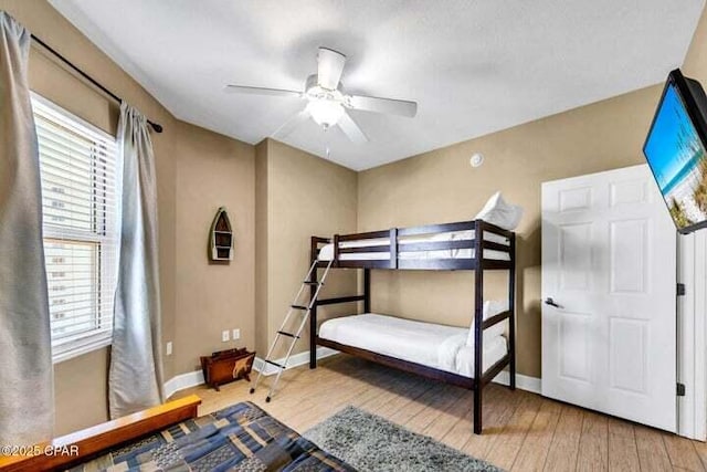14825 Front Beach Rd Unit 2001, Panama City Beach, FL 32413 - bedroom with ceiling fan and light wood-type flooring