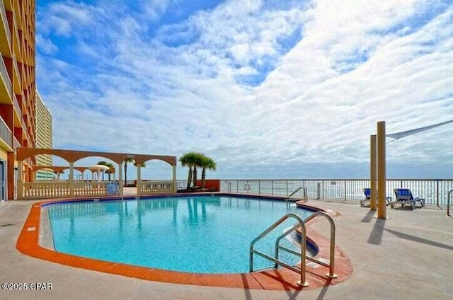 14825 Front Beach Rd Unit 2001, Panama City Beach, FL 32413 - view of pool featuring a water view and a patio area