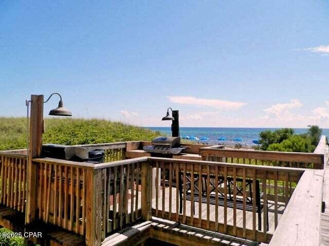 14825 Front Beach Rd Unit 2001, Panama City Beach, FL 32413 - wooden terrace with a water view