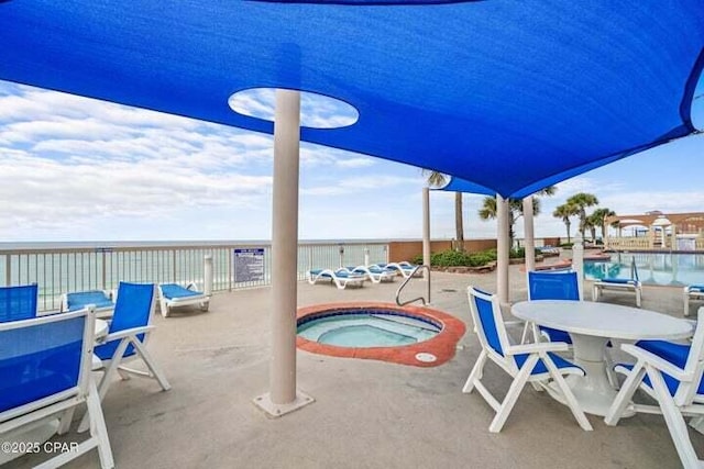 14825 Front Beach Rd Unit 2001, Panama City Beach, FL 32413 - view of pool with a patio area, a community hot tub, and a water view