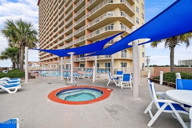 14825 Front Beach Rd Unit 2001, Panama City Beach, FL 32413 - view of pool with a hot tub and a patio