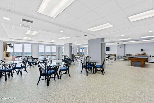 14825 Front Beach Rd Unit 2001, Panama City Beach, FL 32413 - dining room with a healthy amount of sunlight, a water view, a drop ceiling, and billiards