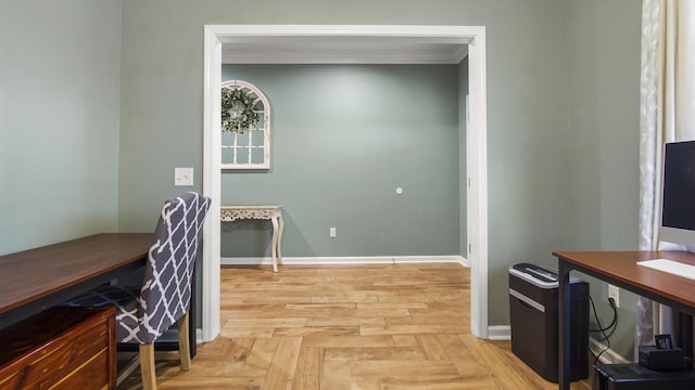 office space featuring light parquet floors and crown molding