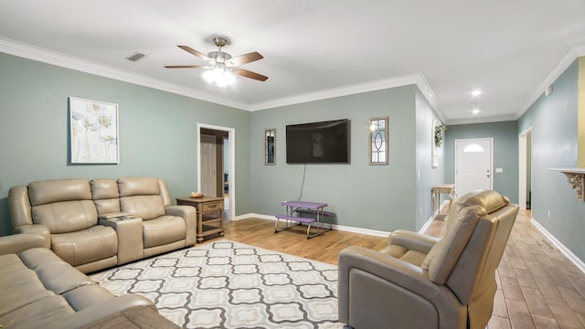 living room featuring crown molding, ceiling fan, and light wood-type flooring