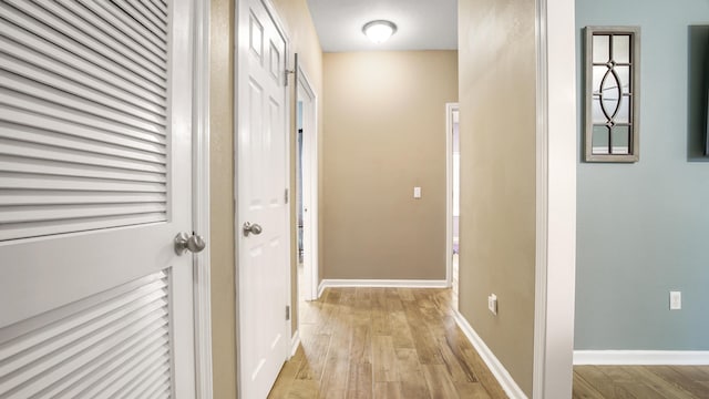 hallway featuring light hardwood / wood-style flooring