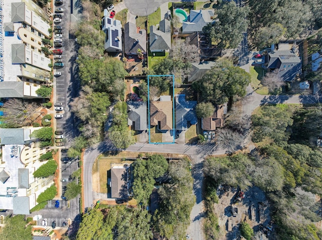 birds eye view of property with a residential view