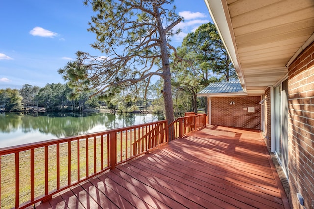 wooden deck with a water view