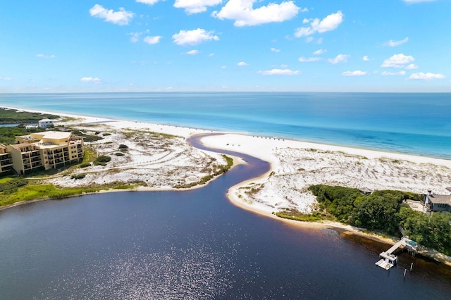 bird's eye view with a water view and a view of the beach