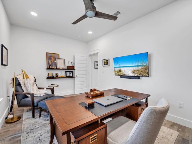 office area featuring hardwood / wood-style flooring and ceiling fan