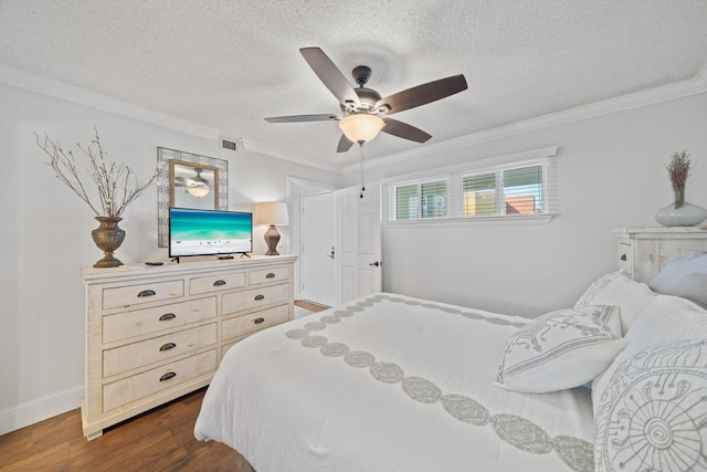 bedroom featuring crown molding, dark wood-type flooring, a textured ceiling, and ceiling fan