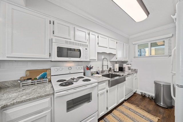 kitchen with white appliances, light stone counters, ornamental molding, sink, and white cabinetry