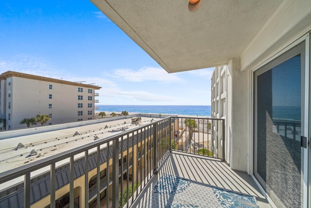 balcony featuring a water view